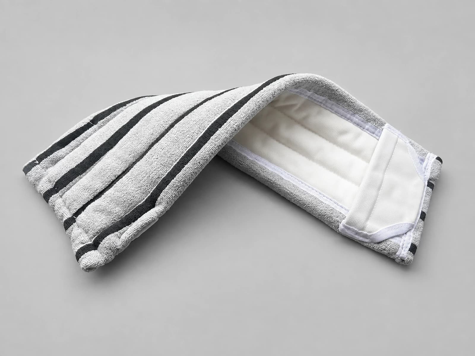 Reusable grey microfiber stripe mop cover, folded construction view