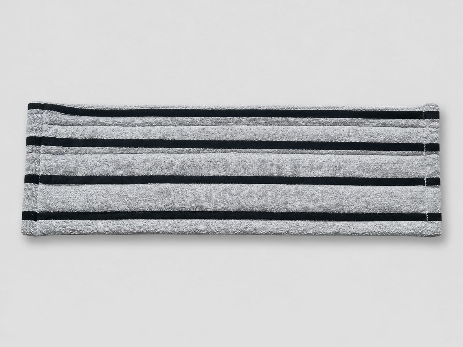 Reusable grey microfiber stripe mop cover, flat profile view