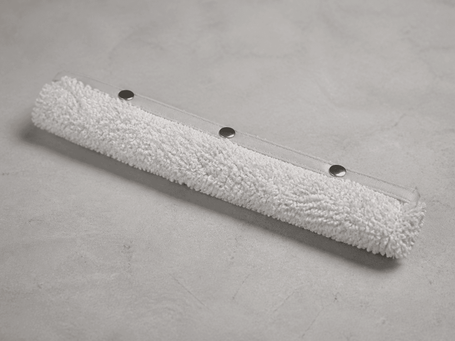 Illustrative reusable tubular round microfiber mop cover
